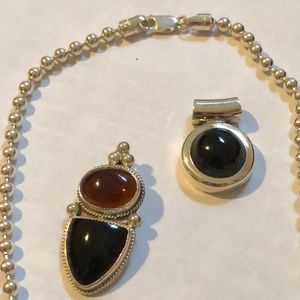 A sterling silver necklace & pendants/onyx & amber